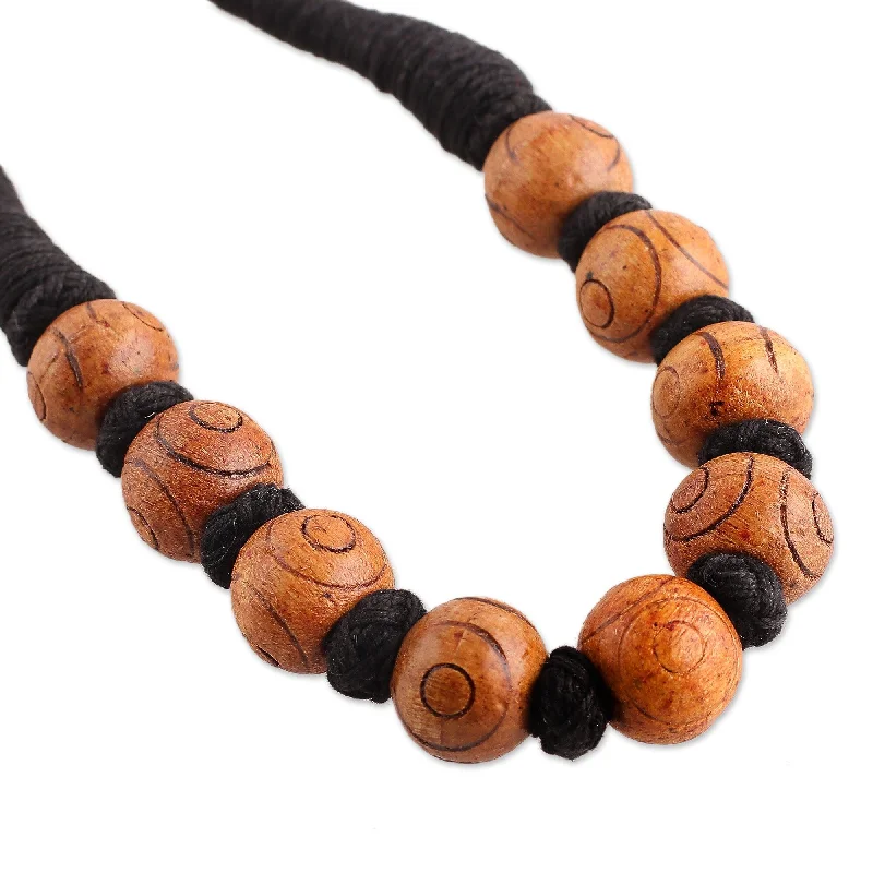 Woven cord necklaces-Novica Handmade Boho Bubbles In Brown Wood Beaded Necklace