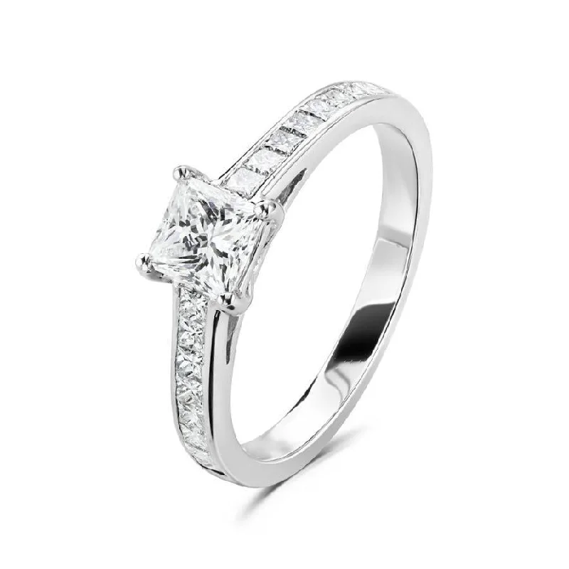 Thin frame engagement rings-Platinum 4 claw set princess cut Diamond solitaire ring with princess cut Diamond shoulders